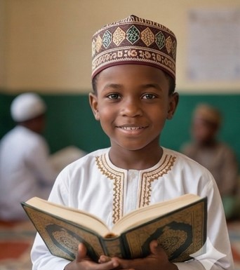 Boy with kufi holding Quran
